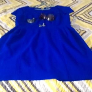 Royal blue knee-length dress with zipper and the back short sleeve.